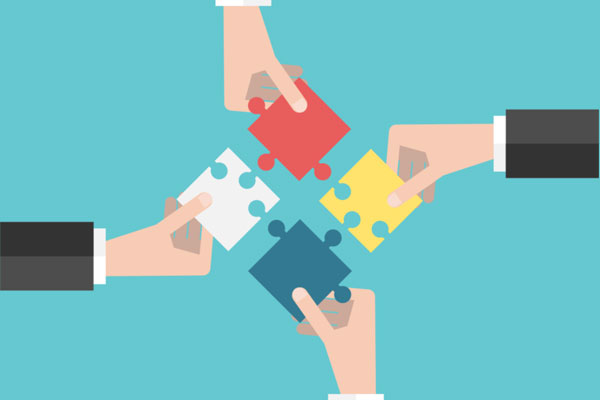 A Year Later, Leaders of Merged Texas Firms Ponder on Future